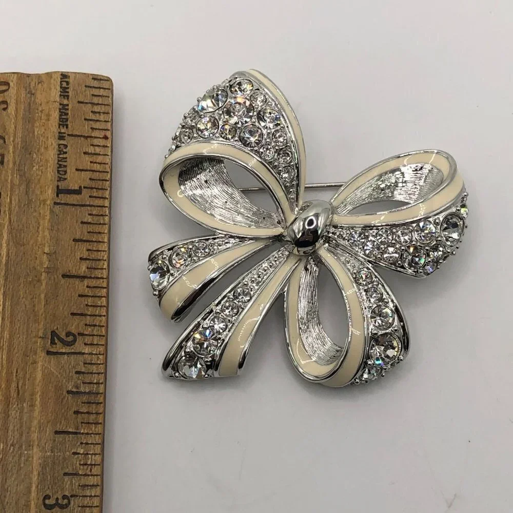 Nolan‎ Miller Bow Pin Brooch Rhinestone Enamel Silver Tone